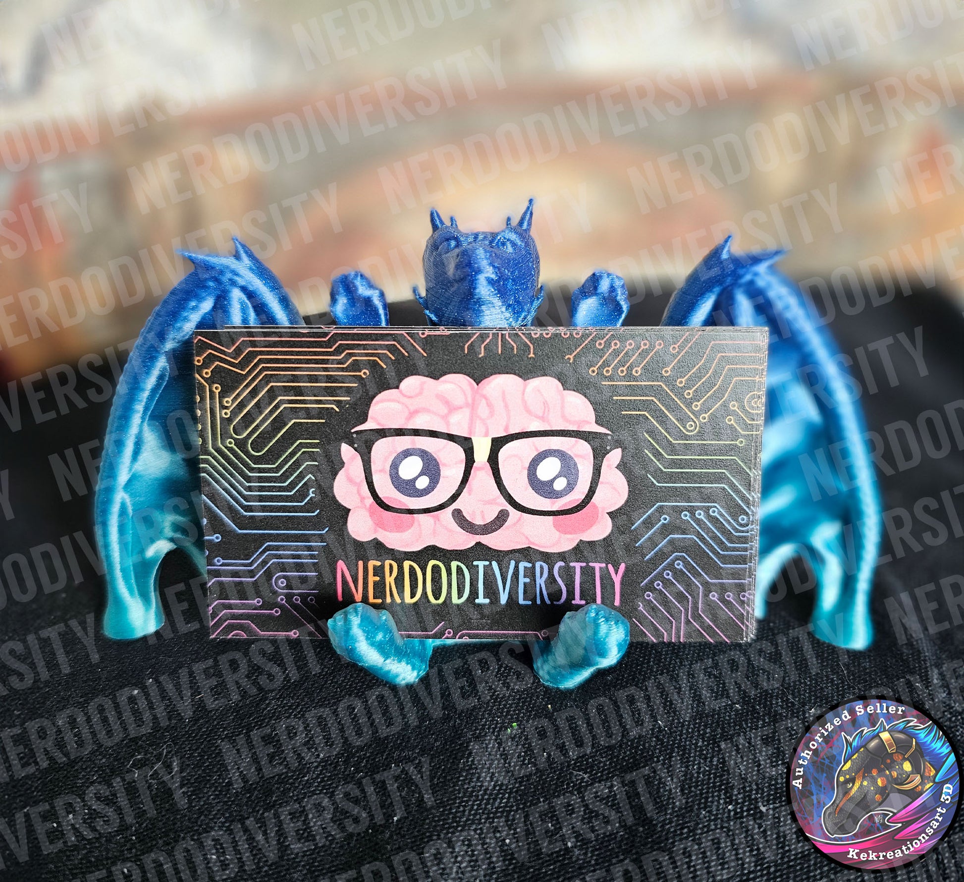 Helpful Dragon - Ocean (holding Nerdodiversity business cards)