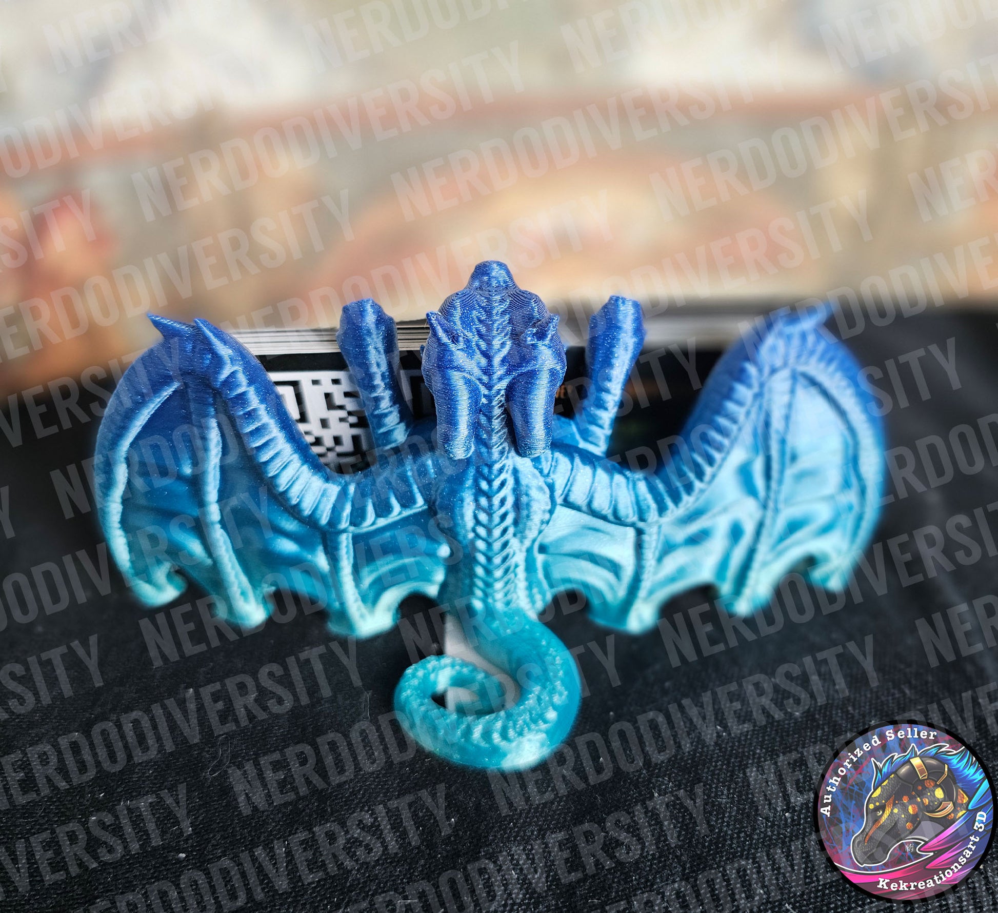 Helpful Dragon - Ocean (back, holding Nerdodiversity business cards)